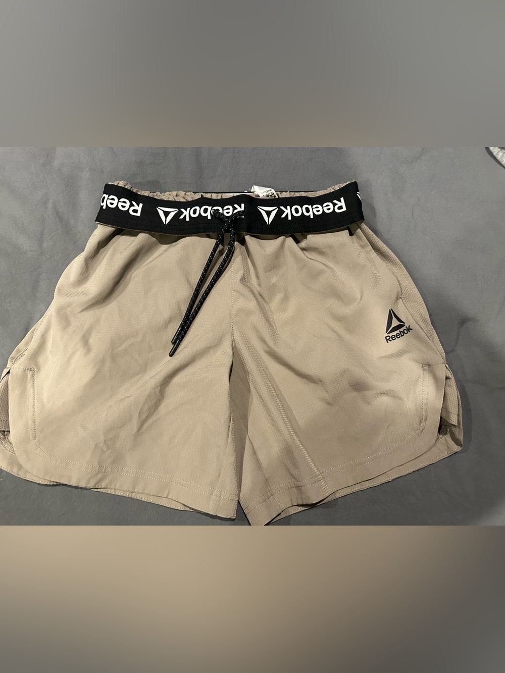 Reebok woman’s Khaki Athletic Shorts with Black Shirt